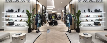 Intérieur de la boutique BOSS au centre commercial Parly 2 avec mannequins, chaussures et mobilier retail
